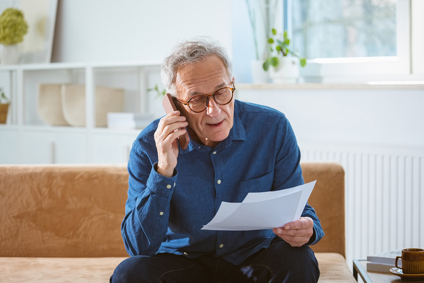 man on phone , claims