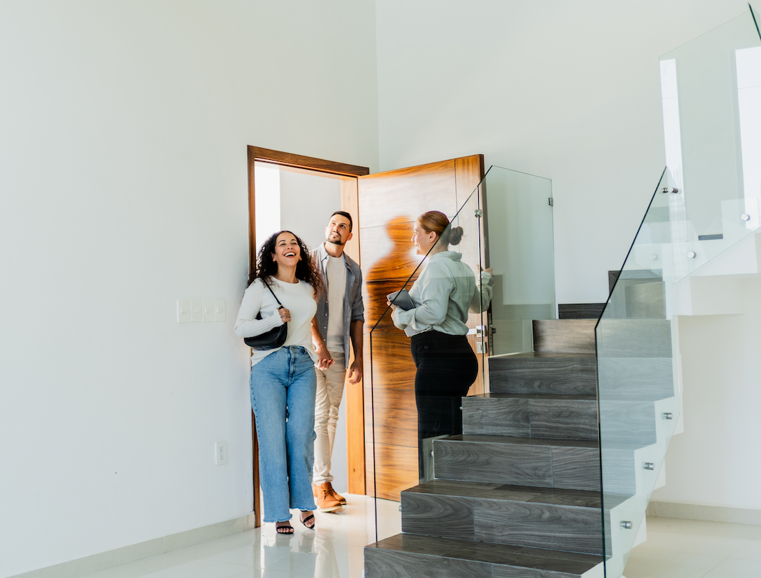 Renters tour empty modern home